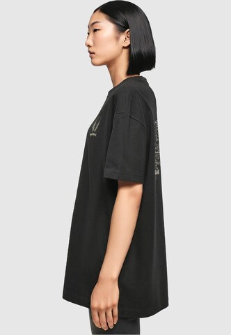 Merchcode Oversized shirt 'Cupid´s Assistant' in Zwart