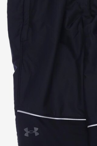 UNDER ARMOUR Stoffhose 33 in Schwarz