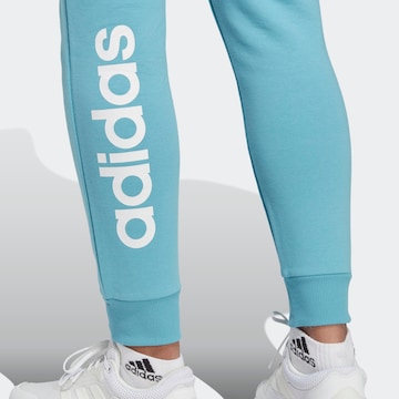 ADIDAS SPORTSWEAR Дънки Tapered Leg Спортен панталон 'Essentials' в синьо