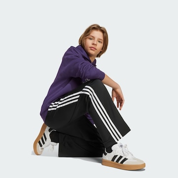 ADIDAS ORIGINALS Loose fit Trousers 'Adicolor' in Black