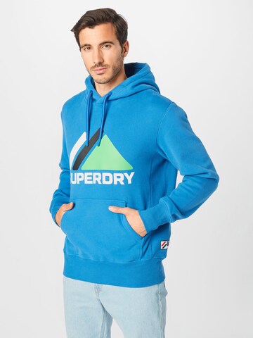 Sweat de sport Superdry en bleu : devant