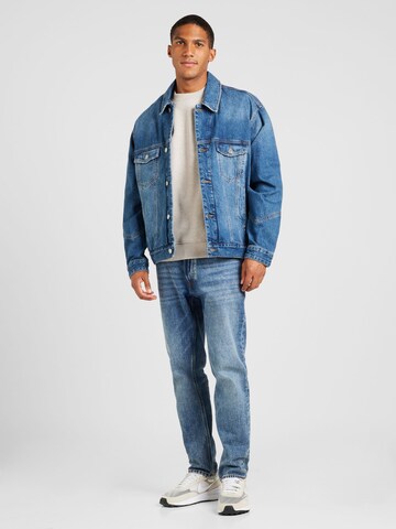 Tommy Jeans Átmeneti dzseki 'GAME DAY' - kék