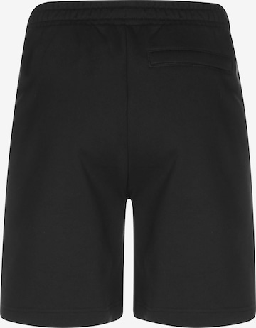 PUMA Loose fit Pants 'Classics Pintuck 8' in Black