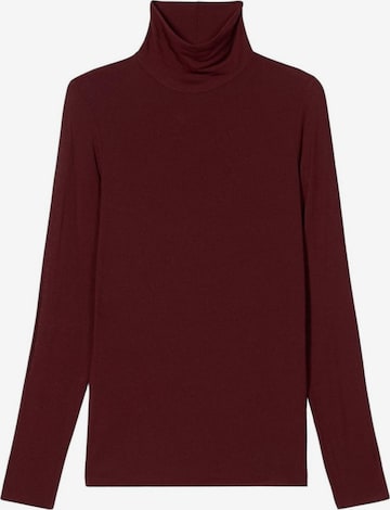 Haut oltre en rouge : devant