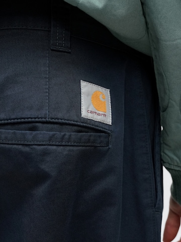 Carhartt WIP Široký strih Plisované nohavice 'Merrick' - Modrá