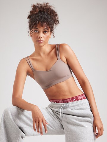 NIKE Бюстье Спортивный бюстгальтер в Коричневый: спереди