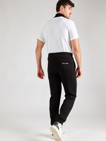Tapered Pantaloni di La Martina in nero