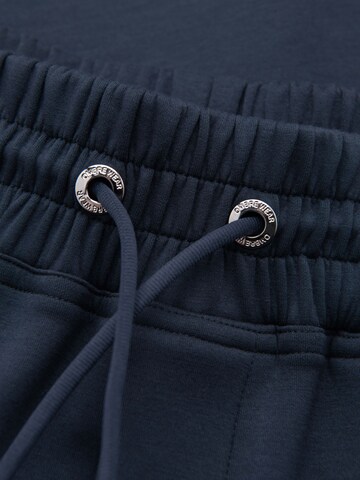 Tapered Pantaloni sportivi di Ombre in blu