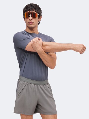 ASICS Regular Workout Pants 'ROAD' in Grey