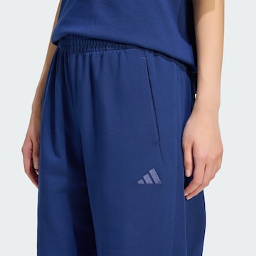 ADIDAS SPORTSWEAR - Tapered Calças de desporto em azul