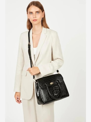 LANCASTER Paris Håndtaske 'Lancaster Sac à Main A rabat avec fermoir Exotic Croco Noir Croco' i sort: forside