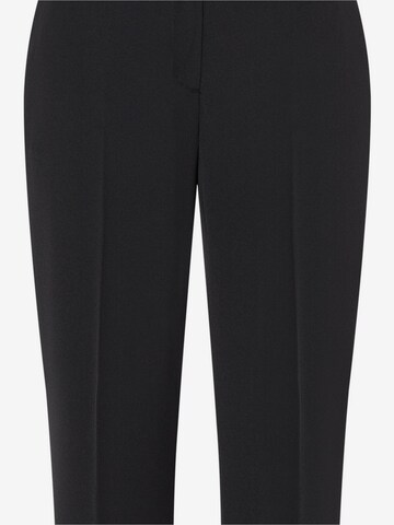 MORE & MORE Flared Trousers with creases in Black