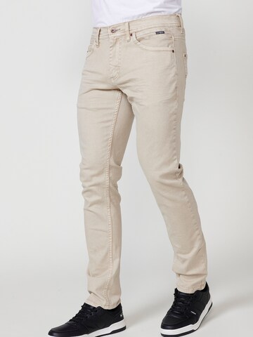 Coupe slim Jean KOROSHI en beige : devant
