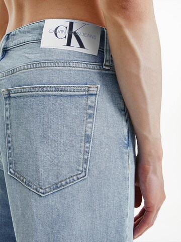 Calvin Klein Jeans Tapered Jeans in Blauw