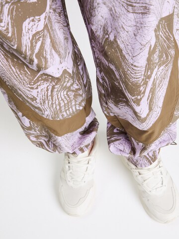 purpurinė ADIDAS BY STELLA MCCARTNEY Siaurėjantis Sportinės kelnės 'Truecasuals '