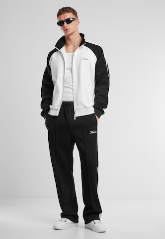 regular Pantaloni sportivi di Karl Kani in nero