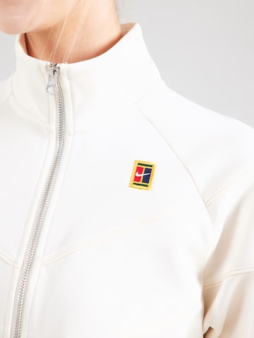 NIKE Αθλητική ζακέτα φούτερ 'HRTGE' σε μπεζ