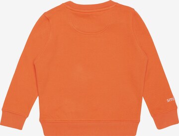 smiler. Sweatshirt in Orange