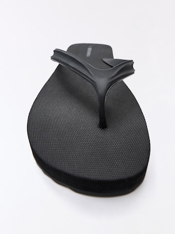 Bershka T-bar sandals in Black