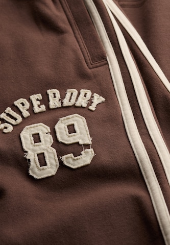 Superdry & Co Loosefit Broek 'Athletic Essentials' in Bruin
