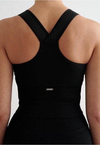 Bustino Reggiseno sportivo di Aim'n in nero