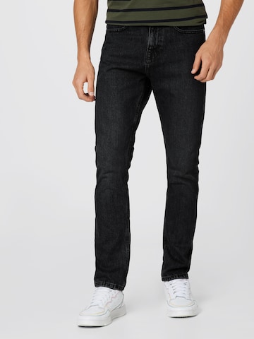 Denim Project Tapered Jeans in Black: front