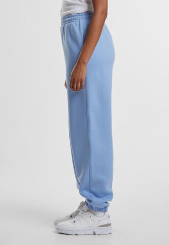 Tapered Pantaloni di Urban Classics in blu