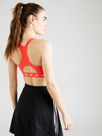 ADIDAS PERFORMANCE Bustier Urheilurintaliivit 'Powerreact' värissä punainen