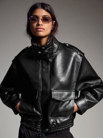 Bershka Between-season jacket in Black: front