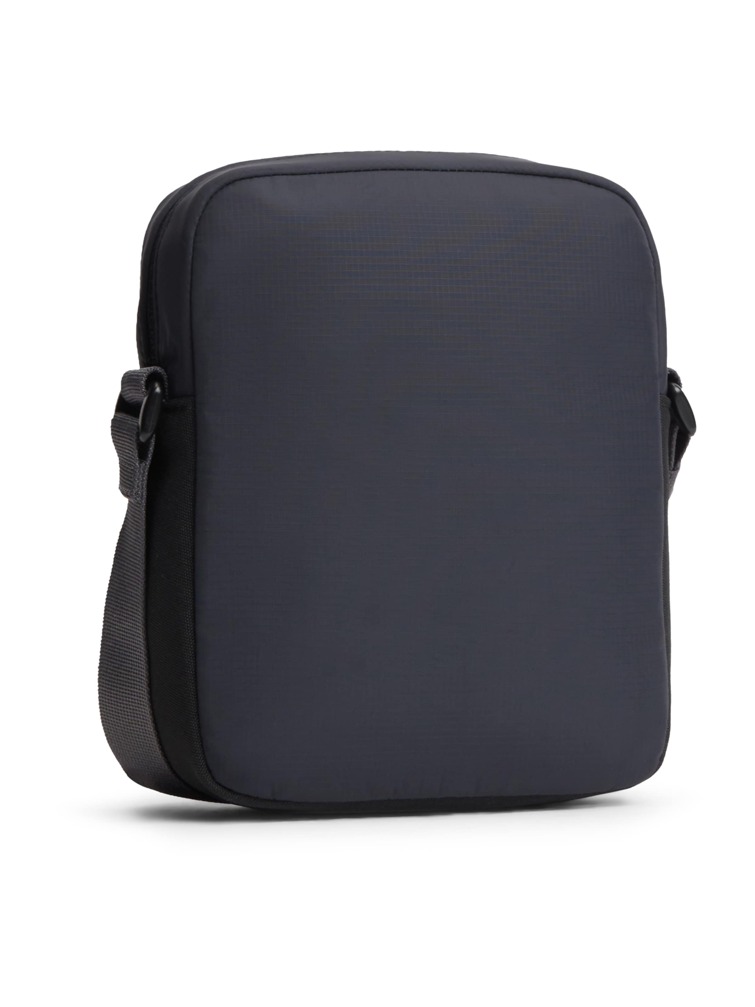 Tommy Jeans Axelremsväska 'REPORTER' i svart