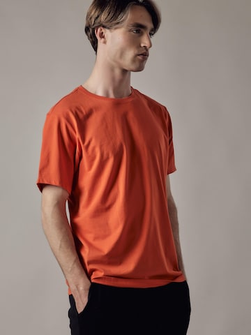 Maglietta 'Girocollo' di OWN Off With Nature in arancione