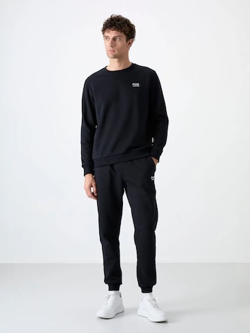 Tommy Life Tracksuit 'Aktive Sets' in Black