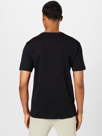 T-Shirt fonctionnel PUMA en noir