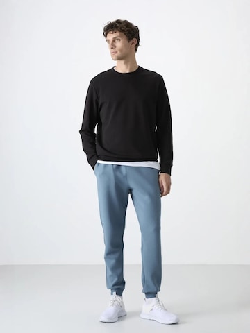 Tommy Life - Skinny Calças de desporto 'Jogginghose' em azul