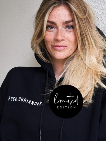 ABOUT YOU Limited Sweatshirt 'Lola' in Zwart: voorkant