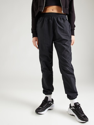 Tapered Pantaloni di Reebok in nero: frontale