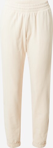 Tapered Pantaloni sportivi 'Legacy' di Champion Authentic Athletic Apparel in beige: frontale