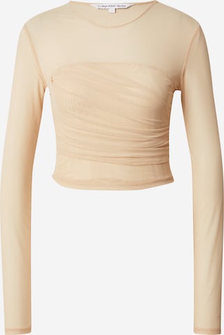 Calvin Klein Jeans T-shirt i beige: framsida