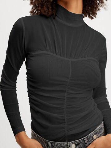 Gestuz - Blusa 'Ewa' en negro