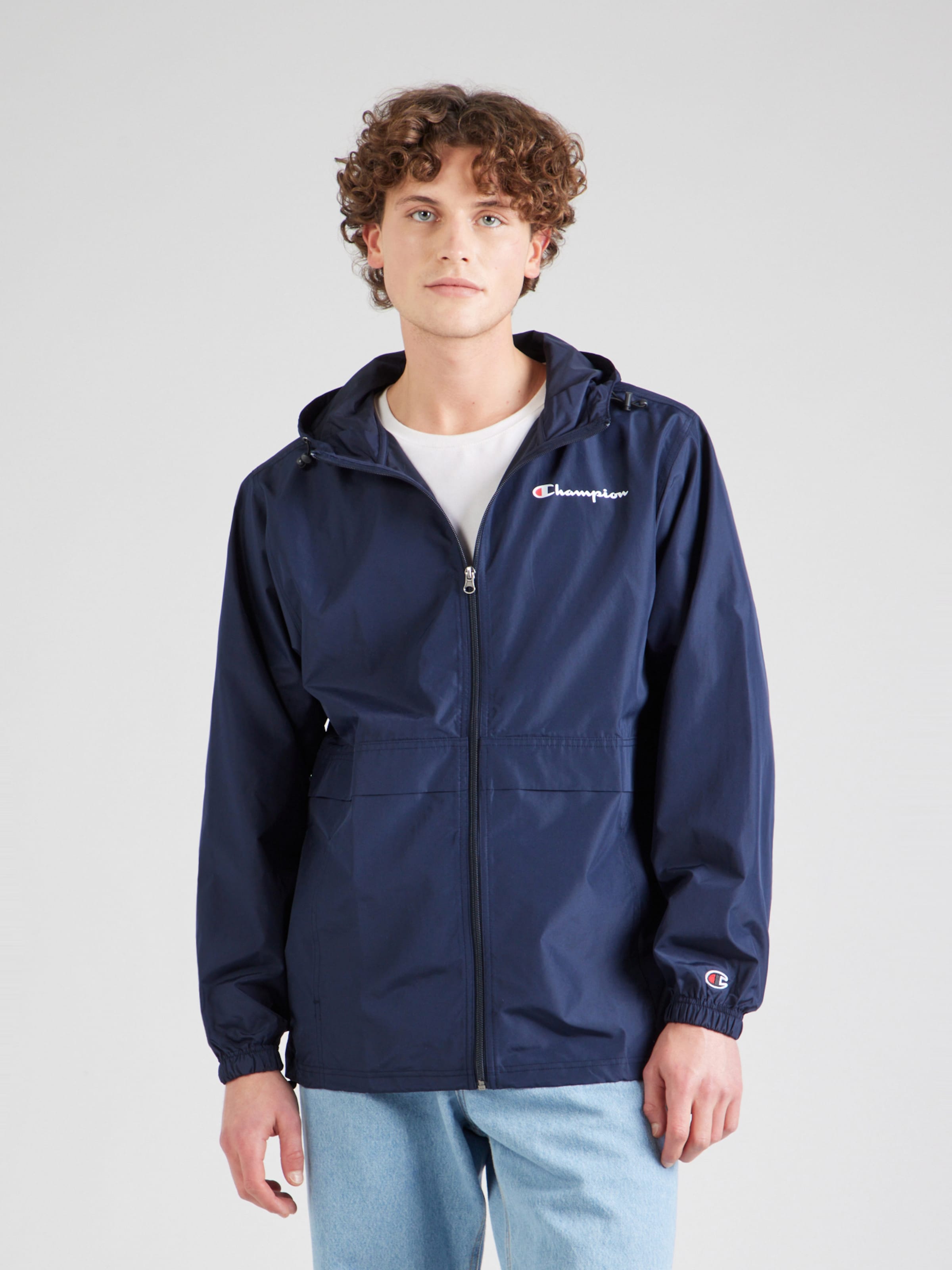 Champion Authentic Athletic Apparel Between season jacket in Navy ABOUT YOU
