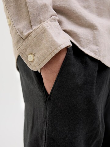 Loosefit Pantalon Jack & Jones Junior en noir