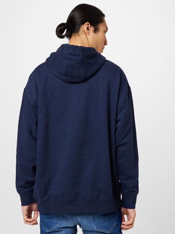 Tommy Jeans - Sudadera en azul