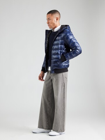 mėlyna Tommy Jeans Demisezoninė striukė