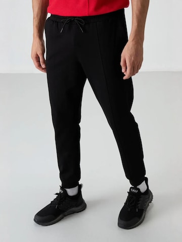 Regular Pantalon de sport Tommy Life en noir