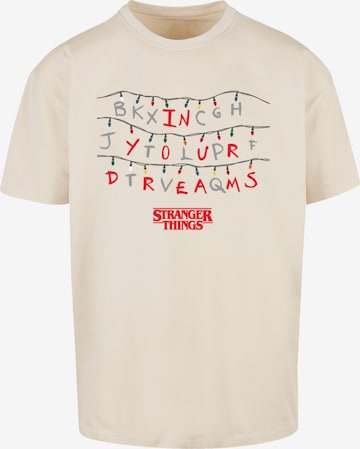 F4NT4STIC T-Shirt 'Stranger Things In Your Dreams Netflix TV Series' in Beige: Vorderseite
