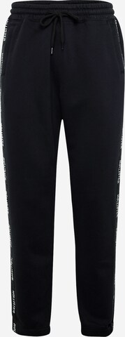 HOLLISTER Tapered Pants in Black: front