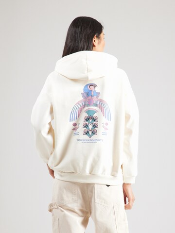 Kaotiko Sweatshirt 'TIMELESS IMMENSITY' in Beige: voorkant