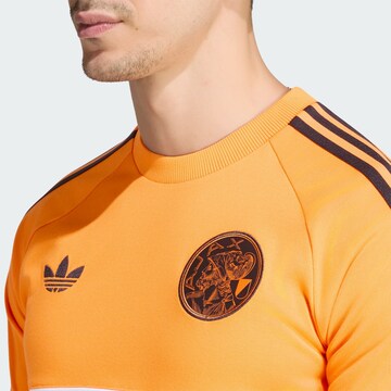 ADIDAS PERFORMANCE - Camiseta funcional 'Ajax Amsterdam' en naranja