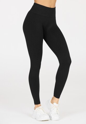 Athlecia Slim fit Leggings in Black: front