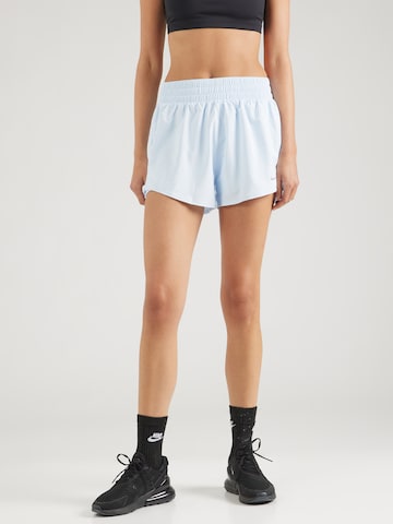 Regular Pantaloni sport 'ONE' de la NIKE pe albastru: față